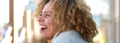 woman smiling after online salad money loan