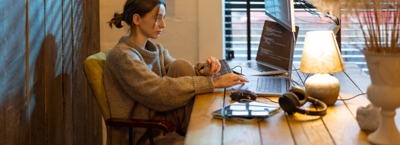 women working from home, sorting her finances 