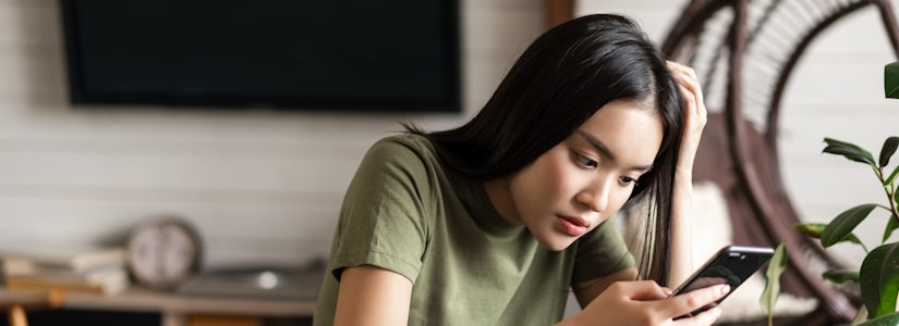 woman checking for loan scam