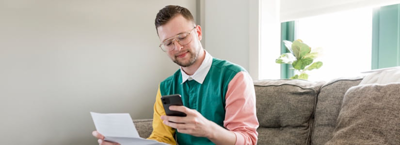 man checking financial vulnerability on phone