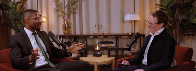 Rotimi Merriman-Johnson sitting with Jamie Veitch