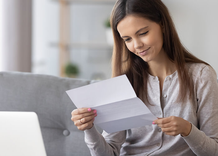 Women reads bank letter